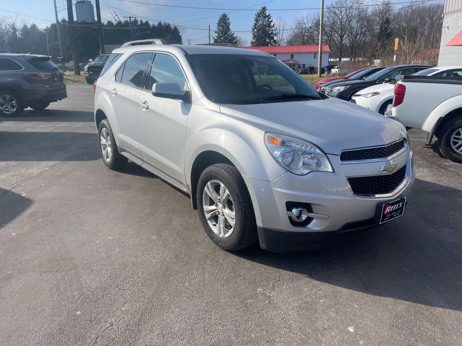 2013 Silver /Black Chevrolet Equinox 2LT 2WD (2GNALPEK5D6) with an 2.4L I4 DOHC 16V engine, 6-Speed Automatic transmission, located at 11115 Chardon Rd. , Chardon, OH, 44024, (440) 214-9705, 41.580246, -81.241943 - This 2013 Chevrolet Equinox 2LT FWD with the 2.4L EcoTec engine pairs fuel efficiency with comfort and technology. It comes equipped with a 6-speed automatic transmission assuring smooth transitions and features heated seats for added comfort during colder months. The automatic climate control syste - Photo #2